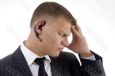 disturb businessman holding his head