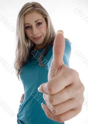 smiling woman showing approval sign