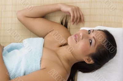 relaxing beautiful woman looking at camera