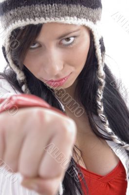 young female posing with clenched fist