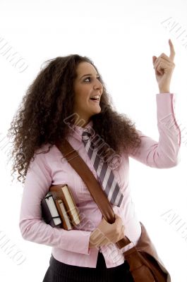young high school student with pointing finger