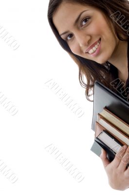 smiling college student with books