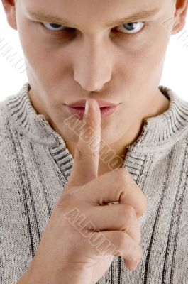close up of man instructing you to be silent