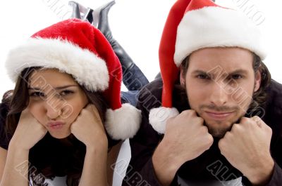 close up view of young couple wearing christmas