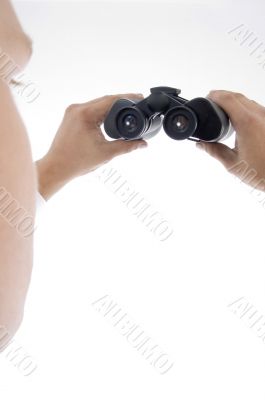 man holding binoculars