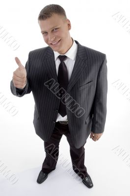 smiling businessman with thumbs up