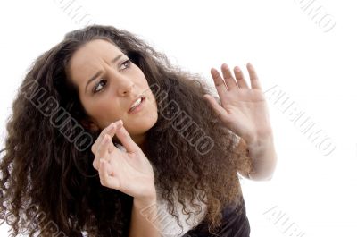latin american female surprised after looking