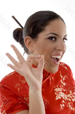 female showing okay sign