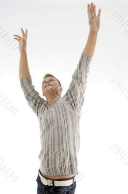 smiling man stretching his arms