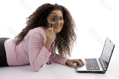 beautiful young businesswoman working on laptop