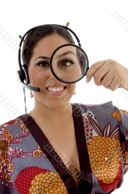 japanese female looking through magnifying lens