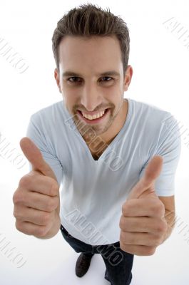 young man showing thumbs up gesture