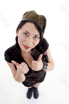 stylish pose of young with thumbs up