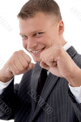 smiling professional showing boxing gesture