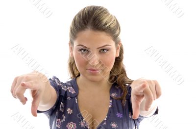young girl pointing at camera