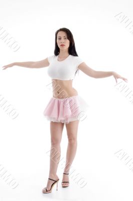 young woman posing with outstretched arms