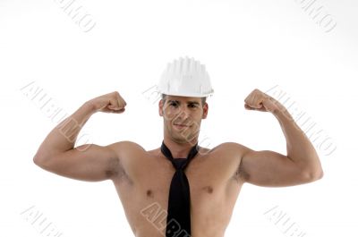 muscular man wearing architect helmet