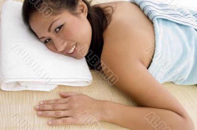 laying model looking at camera