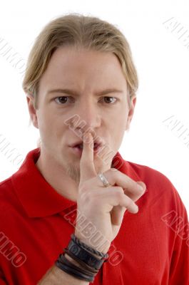handsome young guy shushing