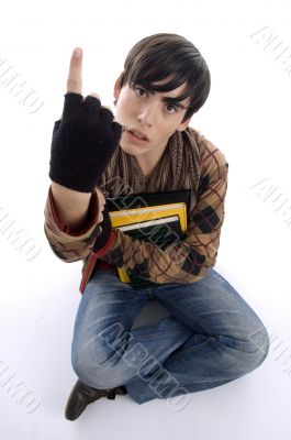 sitting student showing finger