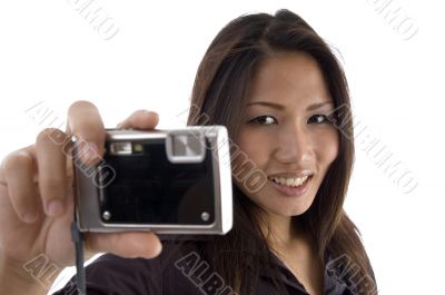 smiling female showing camera