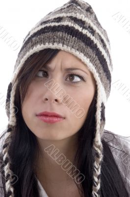 close up view of female model wearing woolen cap