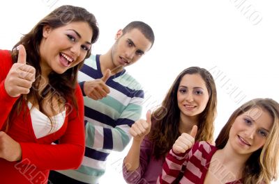 portrait of smiling people with thumbs up