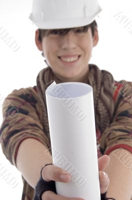 smiling young architect showing paper roll