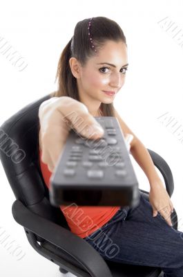 young girl posing with remote