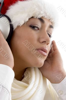 lovely young girl posing with christmas hat