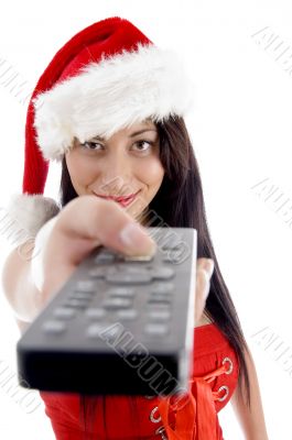 young woman in christmas hat watching television