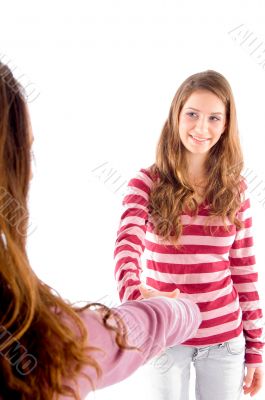 friendly girls shaking hands