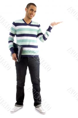 college boy holding laptop and showing