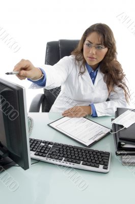 young doctor pointing aside