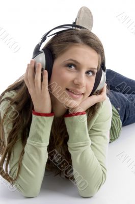 woman listening to music lying down