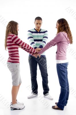 standing friends with joined hands