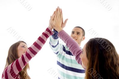 young friends with joined hands
