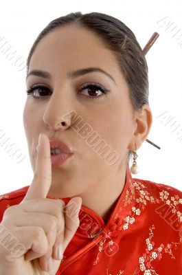 female showing keep shushing sign