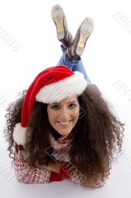laying young female with christmas hat