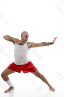male in fighting pose