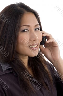  thai female talking on mobile