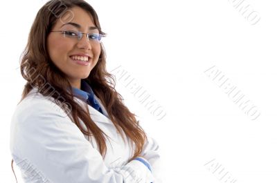 smiling doctor posing with folded arms