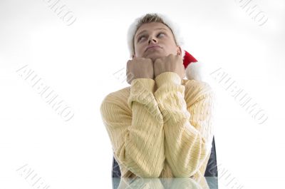 sad man wearing christmas hat