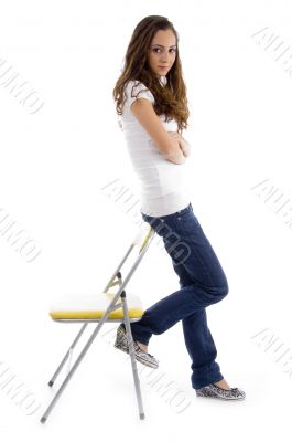 attractive young female standing with support
