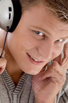 smiling man with headphone