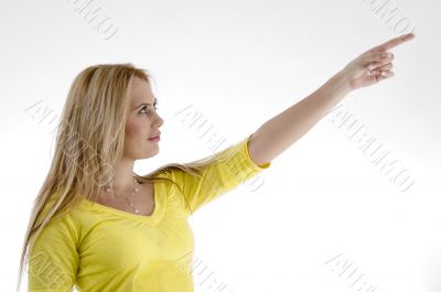 smiling woman pointing side