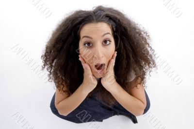 young woman surprised and looking upwards