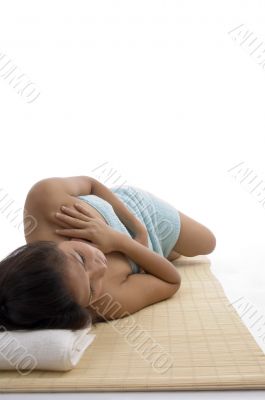 side view of young woman in relaxation pose