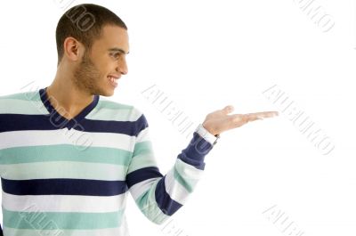 handsome male holding something with hand gesture