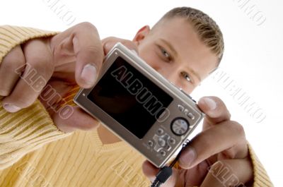 male showing digital camera